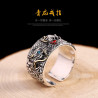 Dragon Ring holding red and blue pear